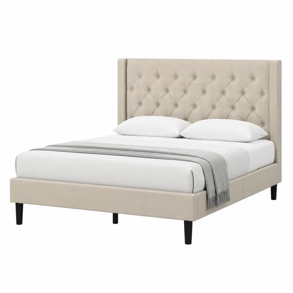 Letto matrimoniale in legno e tessuto beige con testiera capitonnè